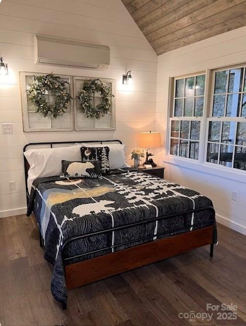 bedroom featuring lofted ceiling, dark hardwood / wood-style floors, a wall unit AC, and wood ceiling