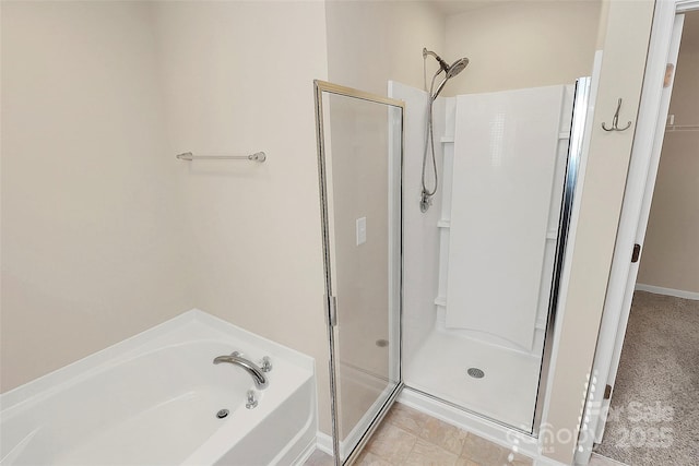 bathroom featuring plus walk in shower