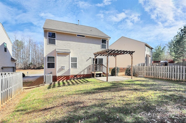 rear view of house featuring a pergola, a yard, and central AC unit