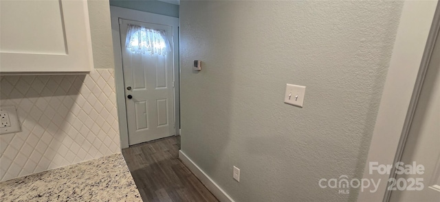 interior space with dark wood-type flooring