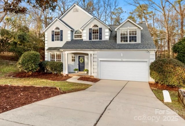 view of front of property with a garage