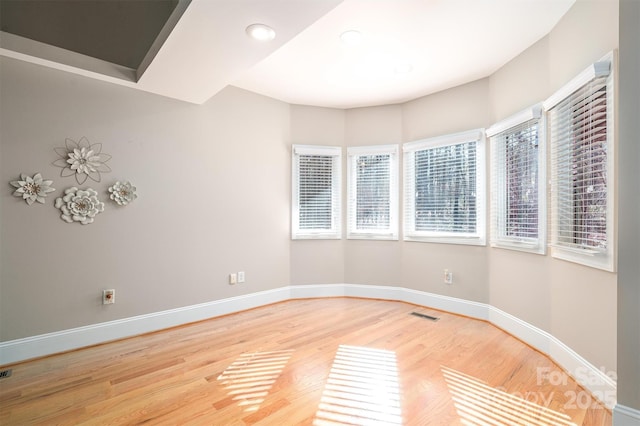 empty room featuring hardwood / wood-style floors