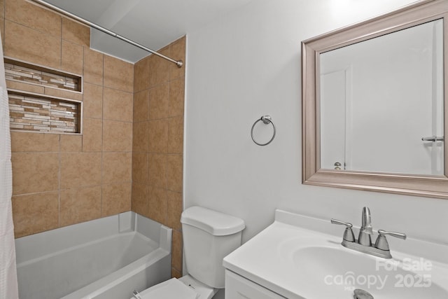 full bathroom featuring toilet, vanity, and shower / bathtub combination with curtain