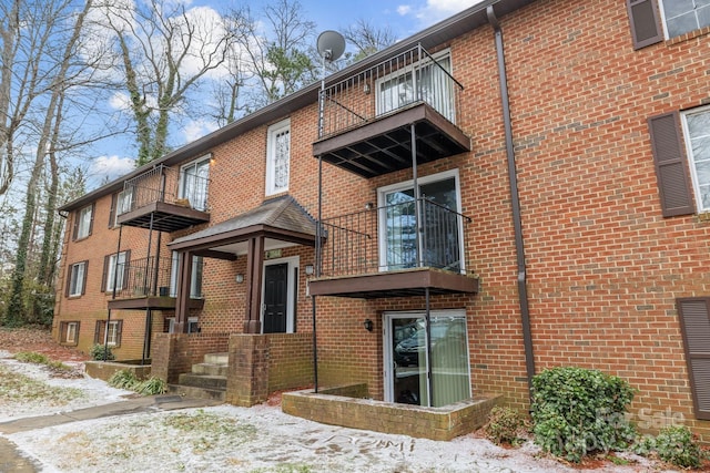 back of house with a balcony