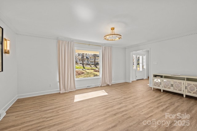 unfurnished bedroom with light wood-type flooring, ornamental molding, and multiple windows