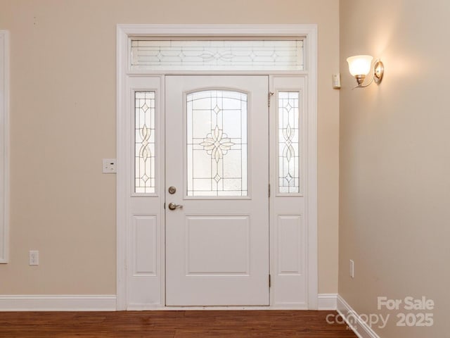 foyer entrance with hardwood / wood-style flooring