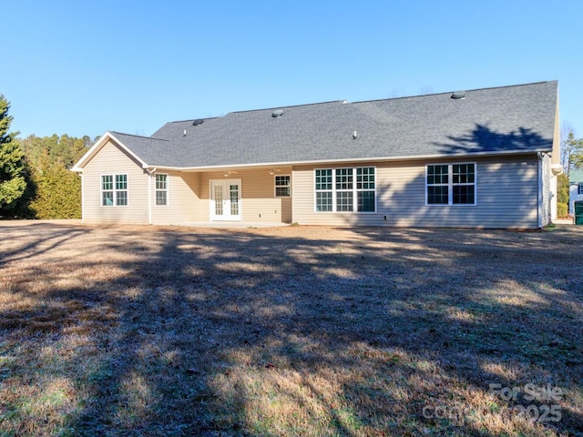 back of house featuring french doors