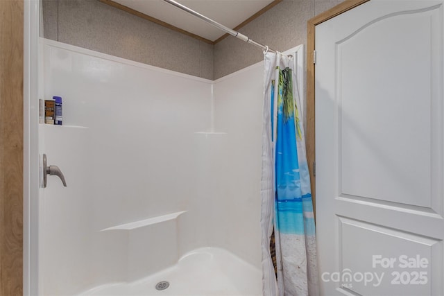 bathroom featuring a shower with curtain