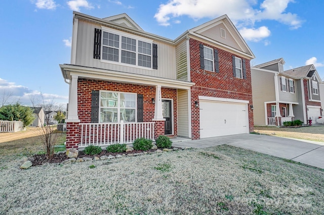 view of front of home with a garage and a front lawn