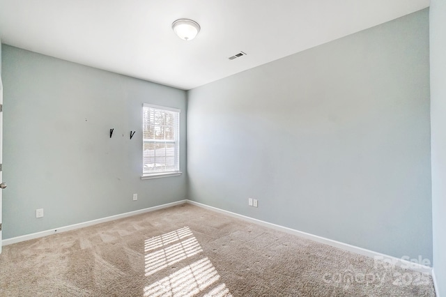 view of carpeted spare room