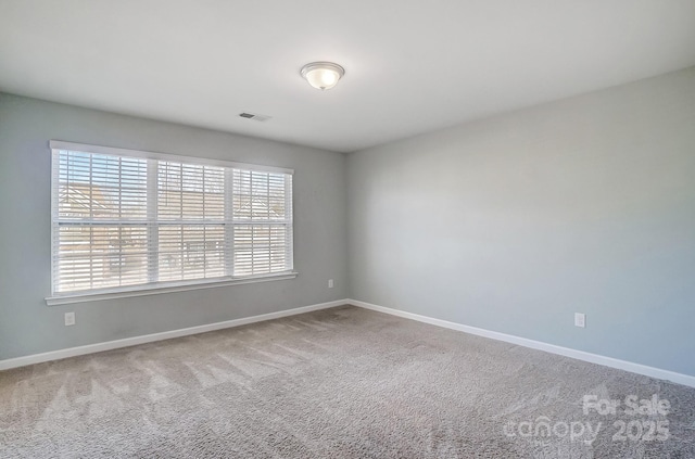 view of carpeted spare room