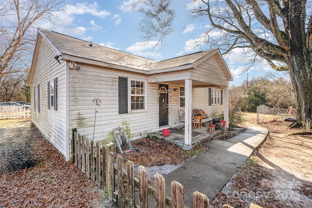 bungalow-style home with a porch