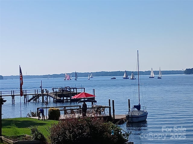 dock area featuring a water view