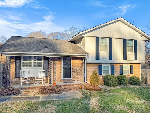 tri-level home featuring covered porch