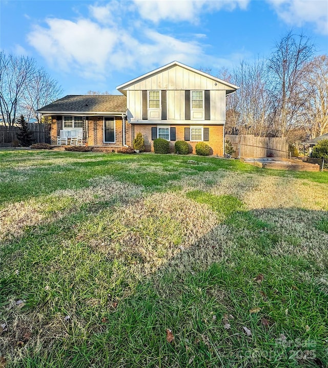 view of front of property with a front lawn