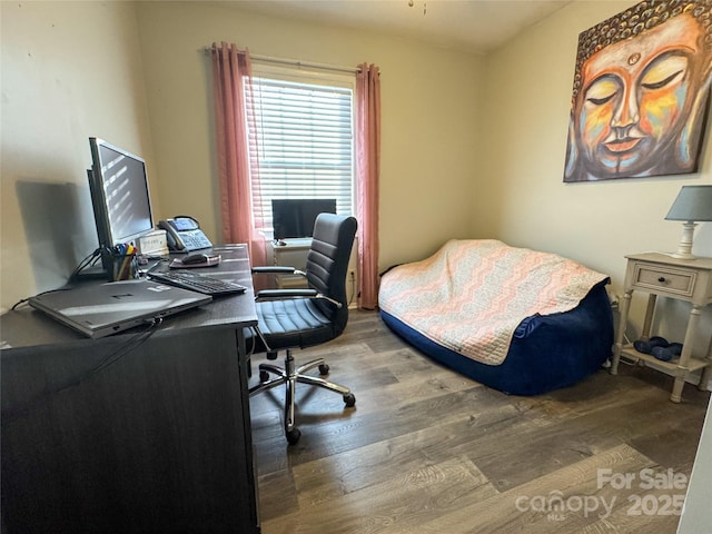 home office with dark wood-type flooring