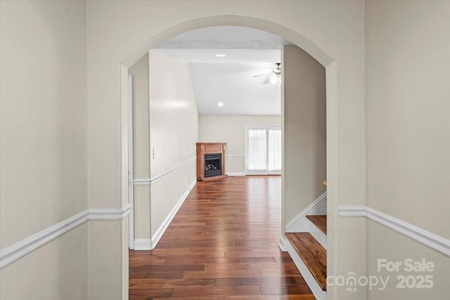 hallway featuring dark hardwood / wood-style flooring