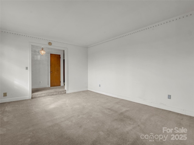 unfurnished room featuring carpet floors