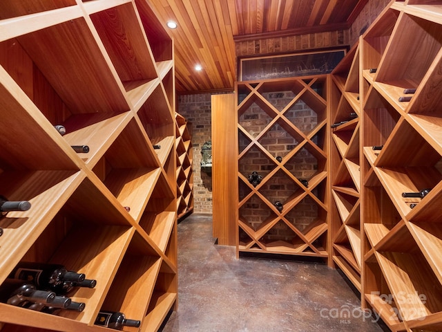 wine cellar featuring wooden ceiling