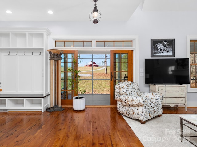 unfurnished living room with hardwood / wood-style floors