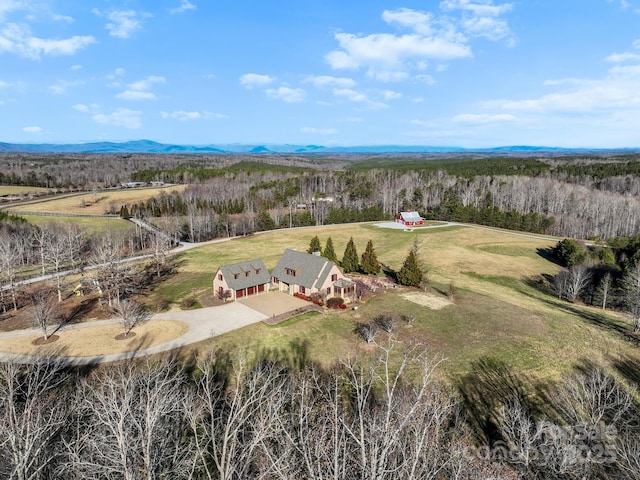 bird's eye view featuring a rural view and a mountain view