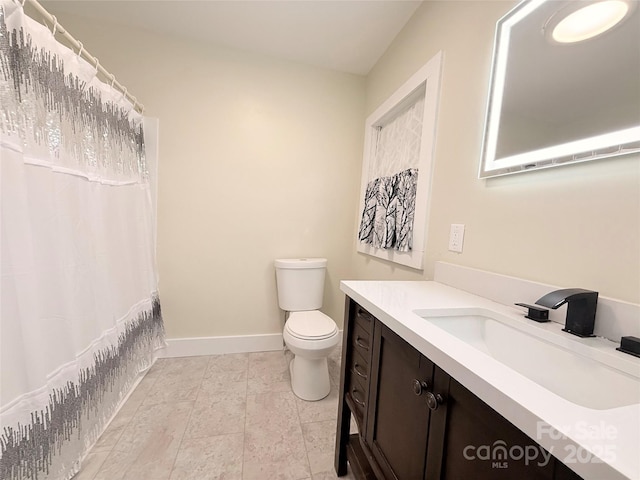 3465 Peniel Rd, Tryon, NC 28782 - full bathroom with vanity, toilet, baseboards, and a shower with shower curtain
