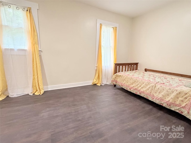 3465 Peniel Rd, Tryon, NC 28782 - bedroom featuring dark wood-style flooring and baseboards