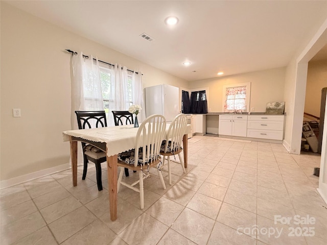 3465 Peniel Rd, Tryon, NC 28782 - dining area with light tile patterned flooring, recessed lighting, and baseboards