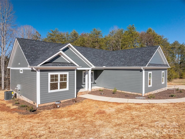 view of front of property with central AC unit