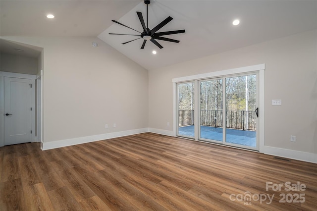 unfurnished living room with ceiling fan, lofted ceiling, and wood-type flooring