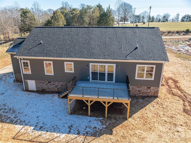 back of house with a wooden deck