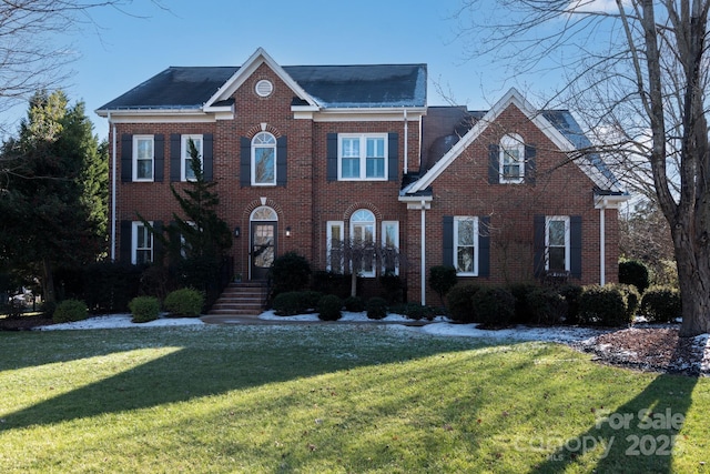 view of front of house with a front lawn