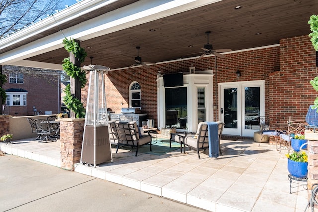 view of patio / terrace featuring ceiling fan and outdoor lounge area