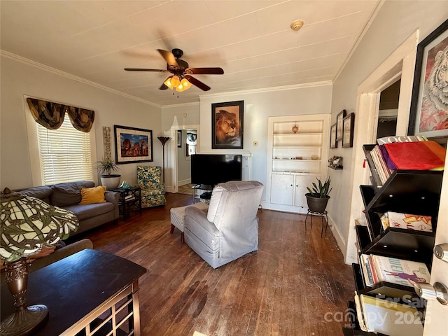 living room featuring dark hardwood / wood-style floors, ceiling fan, and crown molding