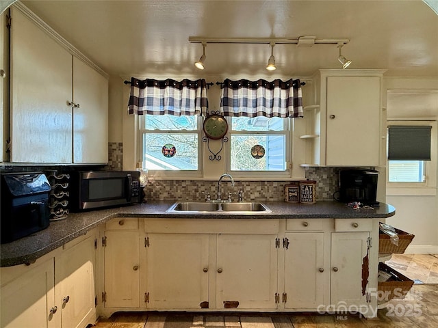 kitchen with decorative backsplash and sink