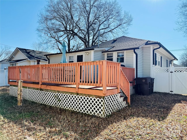 back of property with a deck