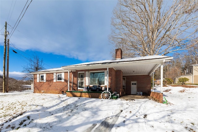 view of front of house featuring a carport