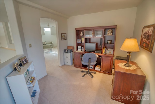 home office featuring ceiling fan and light colored carpet