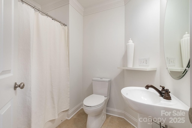 bathroom with sink, toilet, crown molding, and tile patterned flooring