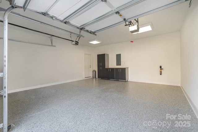 garage featuring a garage door opener and electric panel