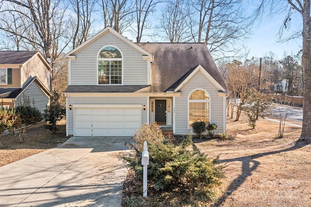 view of front of home with a garage