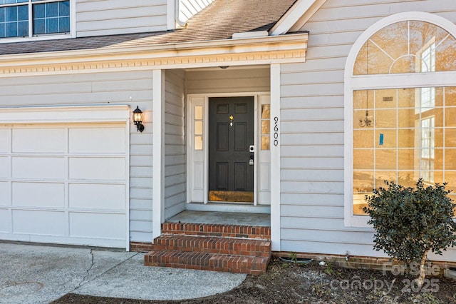 entrance to property with a garage