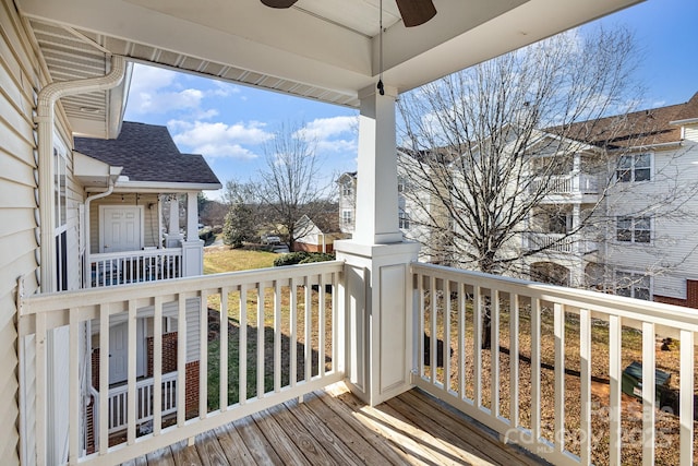 deck featuring ceiling fan and a porch