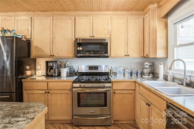 kitchen featuring sink, light brown cabinets, black appliances, and wood ceiling