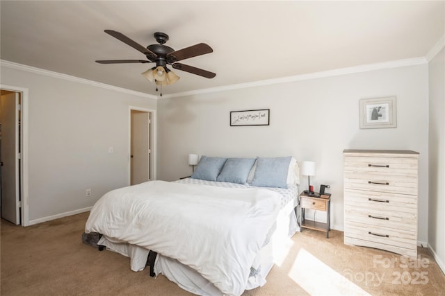 carpeted bedroom featuring ceiling fan and ornamental molding