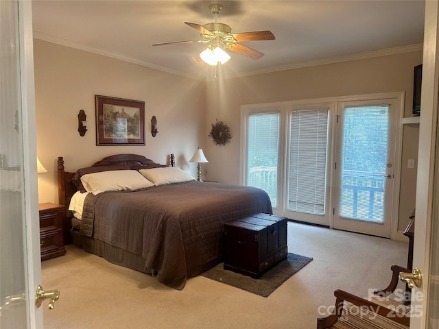 carpeted bedroom featuring ceiling fan, access to outside, crown molding, and multiple windows