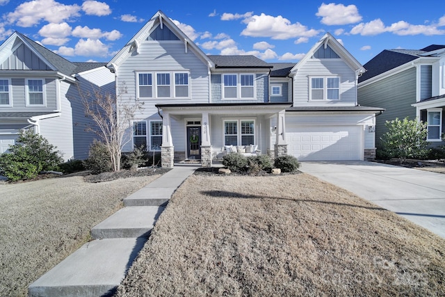 townhome / multi-family property featuring a garage and a porch