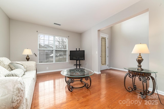 living room with hardwood / wood-style flooring