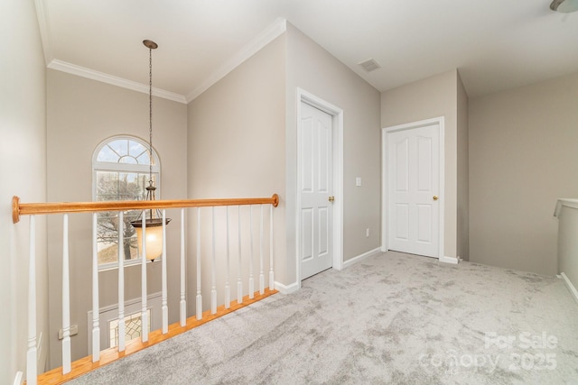 corridor featuring light colored carpet and ornamental molding