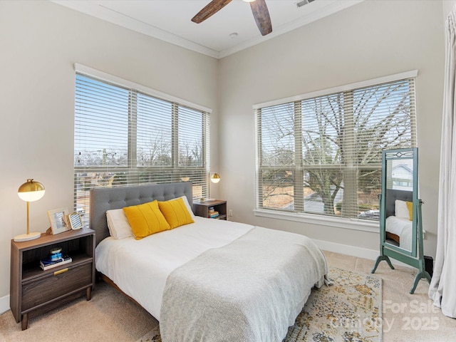 bedroom with crown molding and ceiling fan